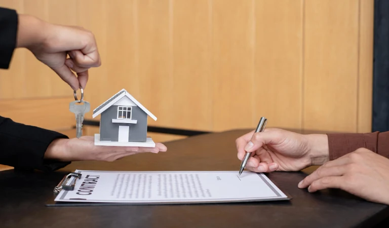 Cropped hands of man working on table